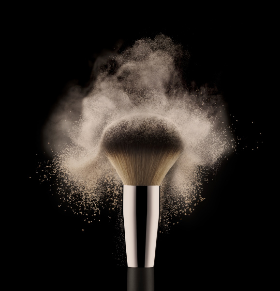 close up of cosmetic powder brush