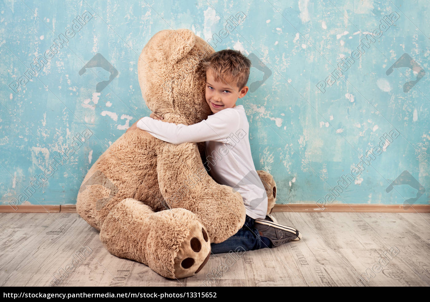 Child with teddy on sale