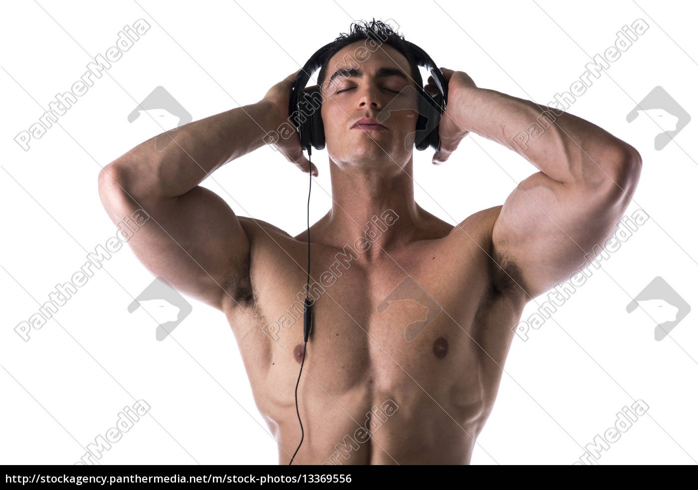 Uomo muscoloso a torso nudo ascoltando musica in cuffia - Stockphoto  #13369556 | Comprate Immagini RF da Panthermedia