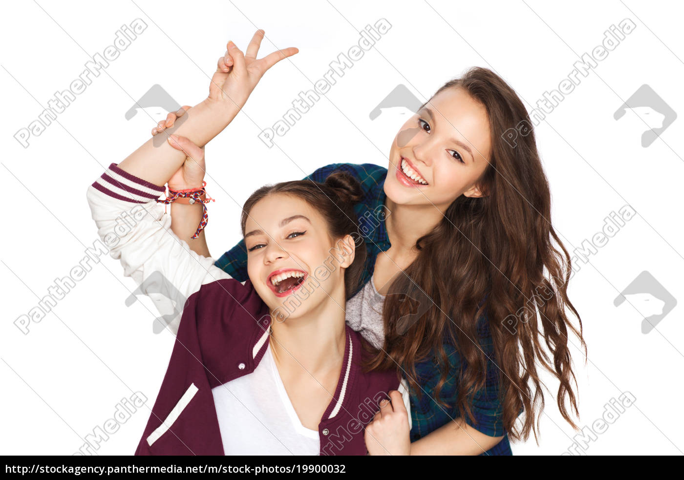 chicas adolescentes bonitas felices mostrando signo de - Stockphoto  #19900032 | Agencia de stock PantherMedia